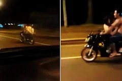 Un couple à moitié nu s'envoie en l'air sur une moto